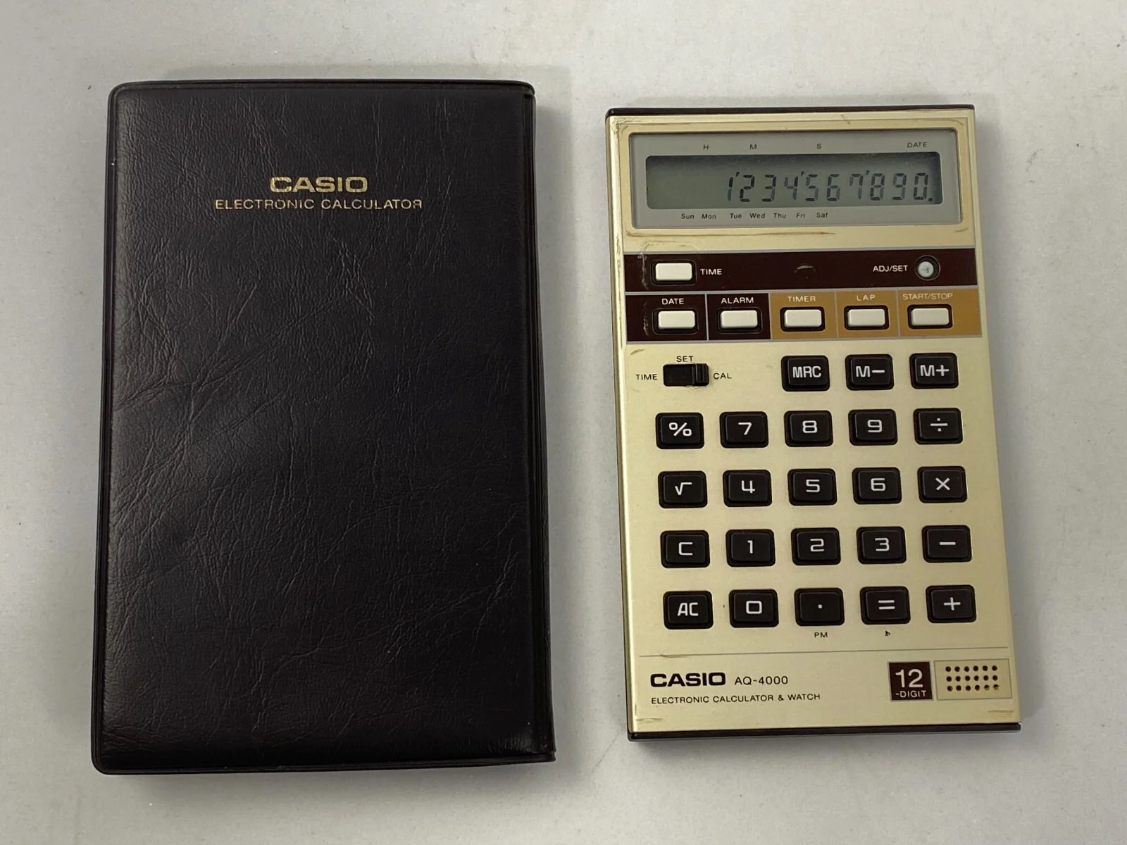 كاسيو AQ-4000 حاسبة إلكترونية وساعة