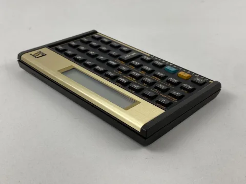 آلة حساب Hewlett Packard HP-12C مع حافظة