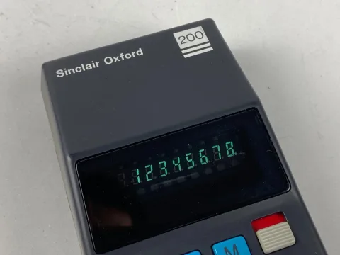 Sinclair Oxford 200 five function calculator with box and instructions