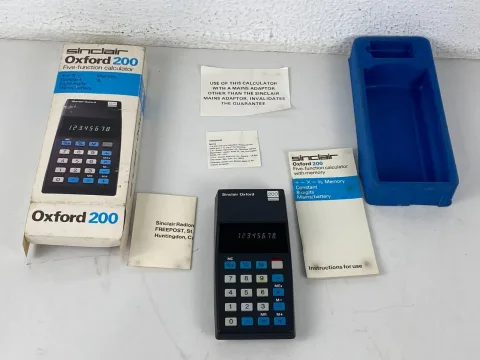 Sinclair Oxford 200 five function calculator with box and instructions
