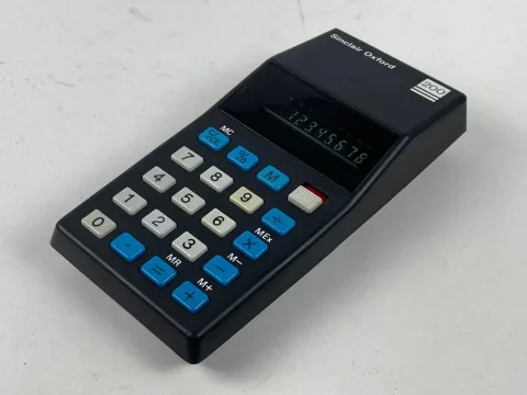 Sinclair Oxford 200 five function calculator with box and instructions