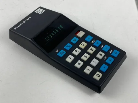 Sinclair Oxford 200 five function calculator with box and instructions