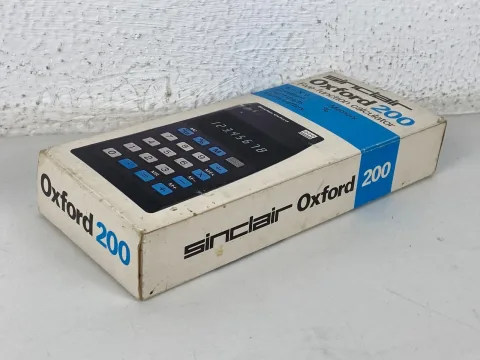 Sinclair Oxford 200 five function calculator with box and instructions