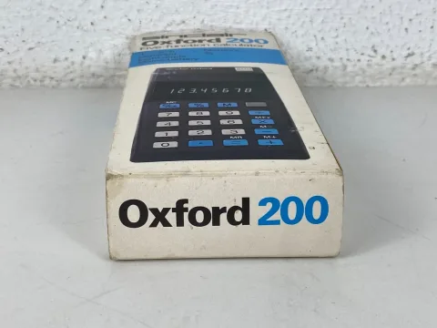 Sinclair Oxford 200 five function calculator with box and instructions