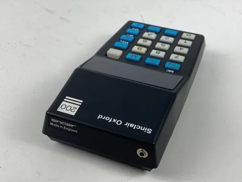 Sinclair Oxford 200 five function calculator with box and instructions