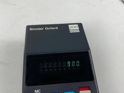 Sinclair Oxford 200 five function calculator with box and instructions