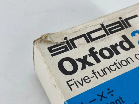Sinclair Oxford 200 five function calculator with box and instructions