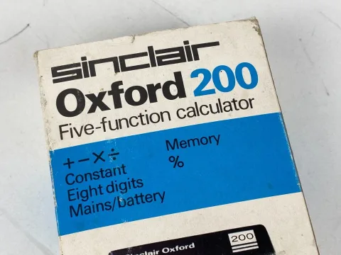 Sinclair Oxford 200 five function calculator with box and instructions
