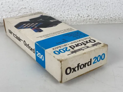Sinclair Oxford 200 five function calculator with box and instructions