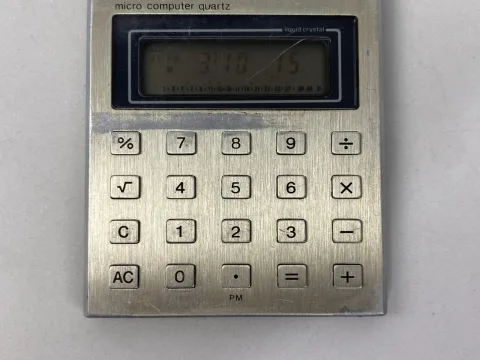 Casio MQ-11 Micro Computer Quartz Calculator Clock