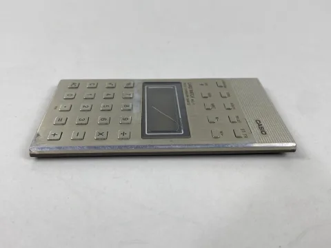 Casio MQ-11 Micro Computer Quartz Calculator Clock