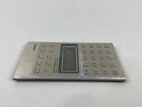 Casio MQ-11 Micro Computer Quartz Calculator Clock