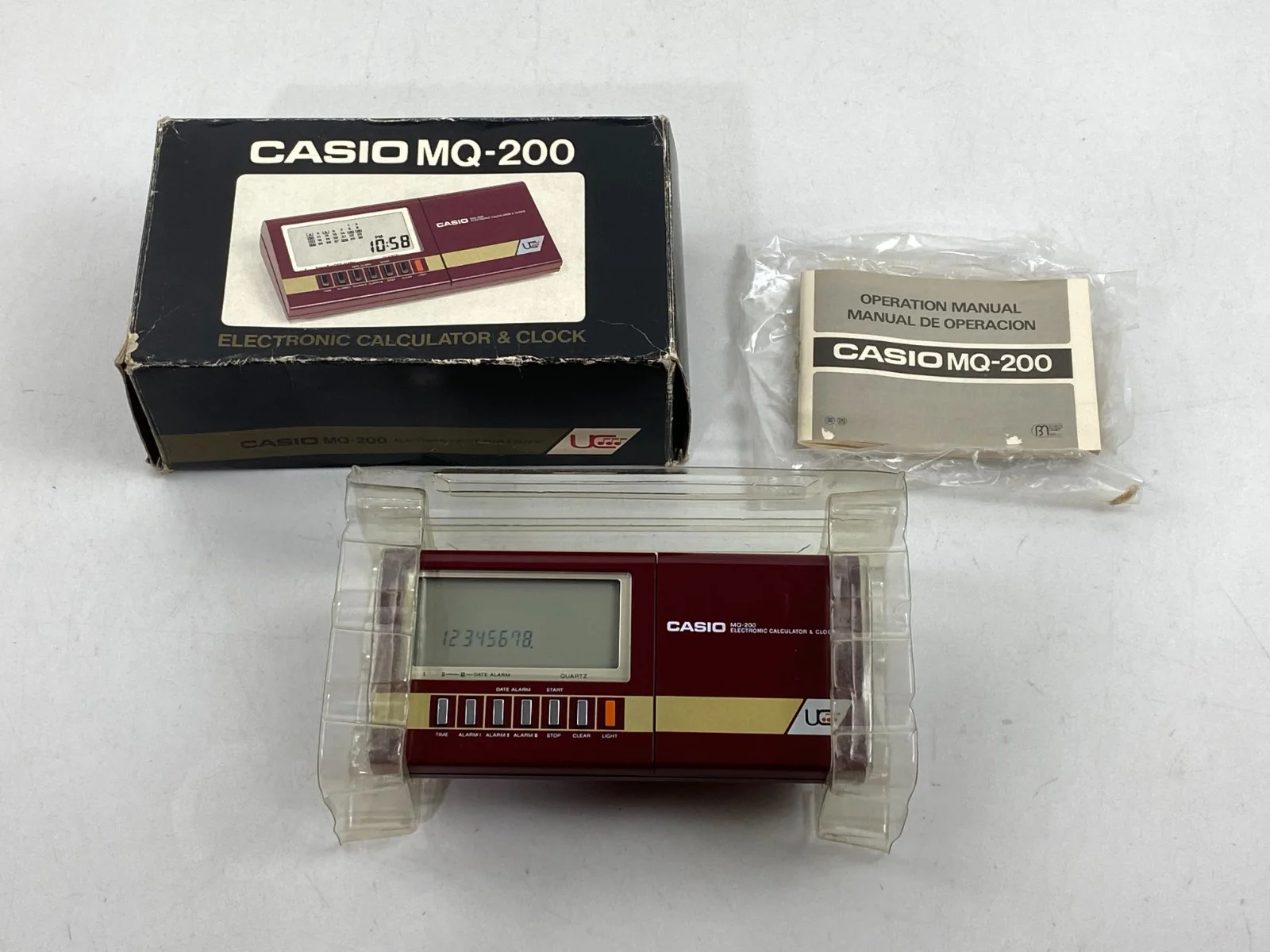 Casio MQ-200 Electronic Calculator &amp Clock LCD Musical Red