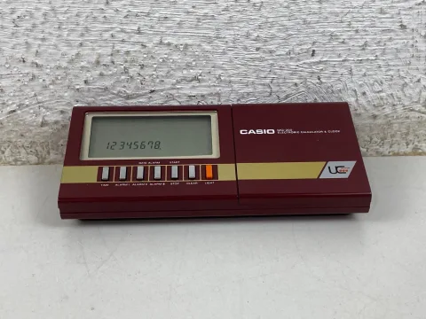 Casio MQ-200 Electronic Calculator &amp Clock LCD Musical Red